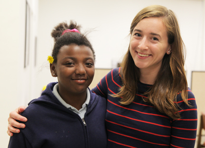 Photo of Acadia Reynolds with a Student