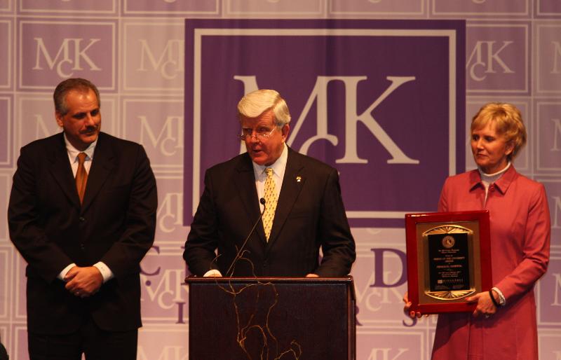 Photo of Mark J. Turner, President James Dennis, and Dr. Richelle Rennegarbe