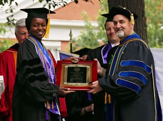 Photo of Dr. John Watters Receiving Award