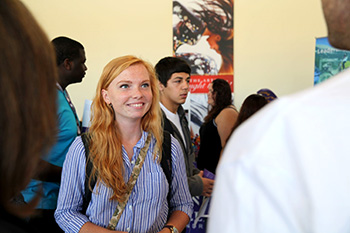 Female Student with Backpack on Campus