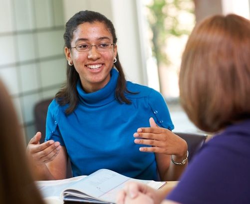 girl talking to counselor