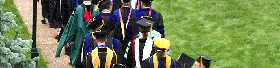 Photo of Faculty Walking on Commencement Day