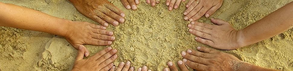 Photo of Hands in the Sand