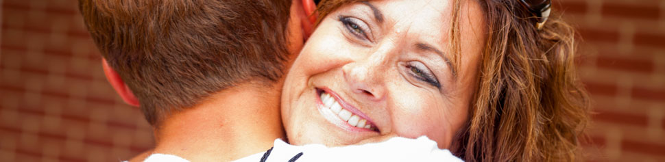 Parent Hugging Student Goodbye at New Student Orientation